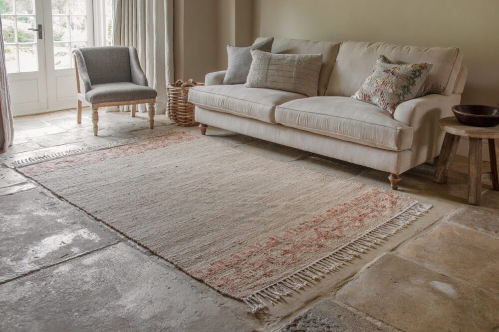akari jute cotton rug in a neutral coloured living room